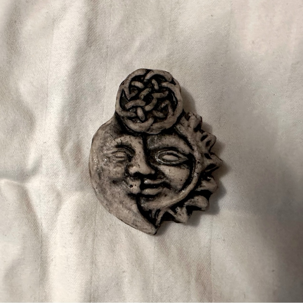 Crescent moon with sun and Celtic knot